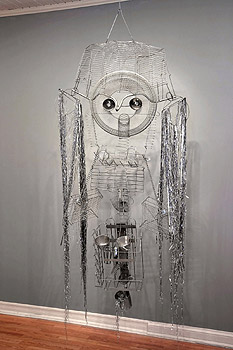 Recycled plastic and found objects sculptures by Diana Boulay - Title: I'm talking to you